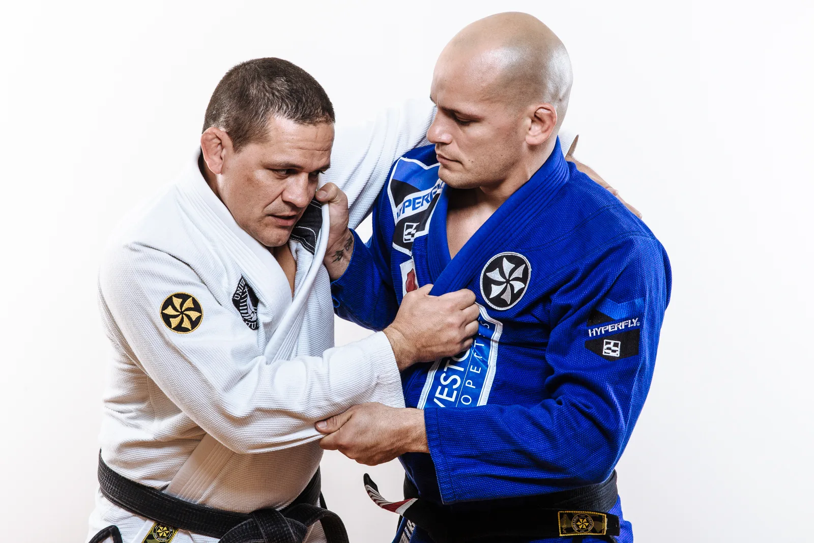 Two black belts standing together